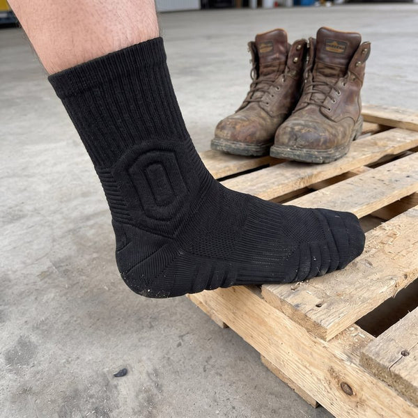 GroundGuard sock in the workshop next to work boots